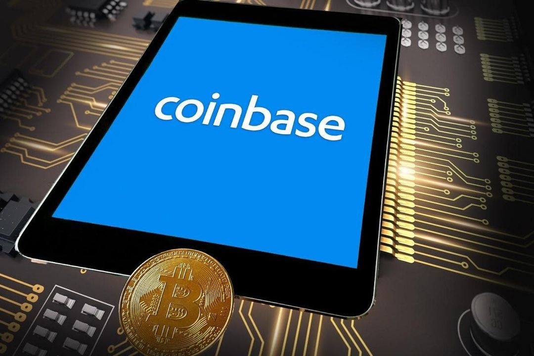 Tablet displaying the Coinbase logo on a circuit board, with a Bitcoin coin beside it
